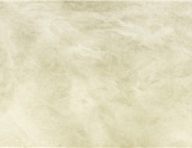 The image shows a close-up view of a light beige marble texture with swirling, cloudy patterns, devoid of any landmarks, buildings, or people.